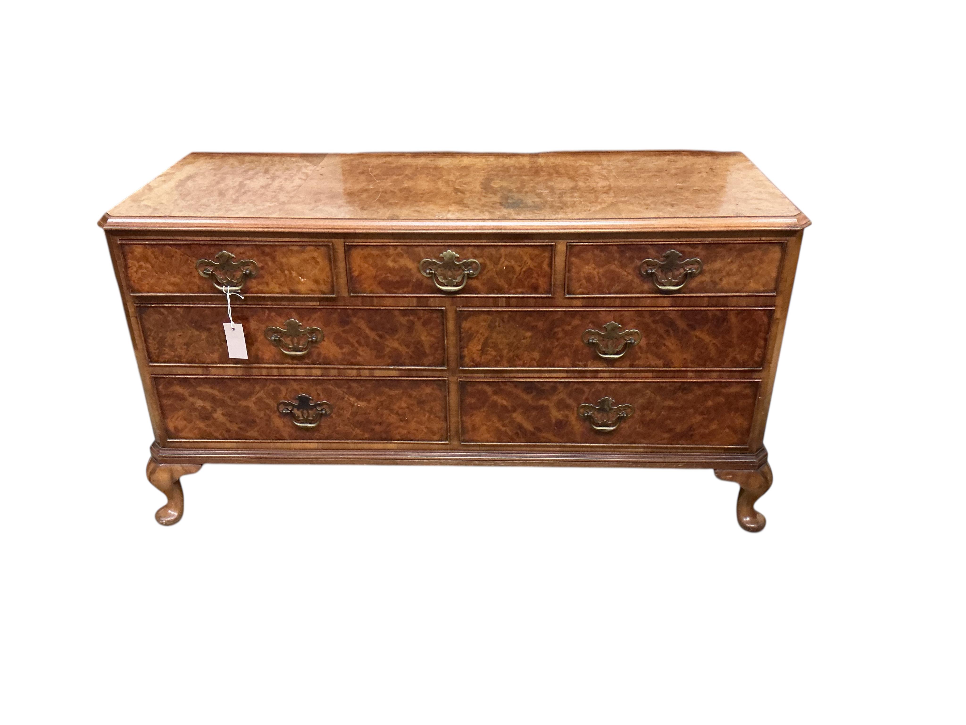 A Queen Anne Revival walnut low chest, width 124cm, depth 46cm, height 66cm